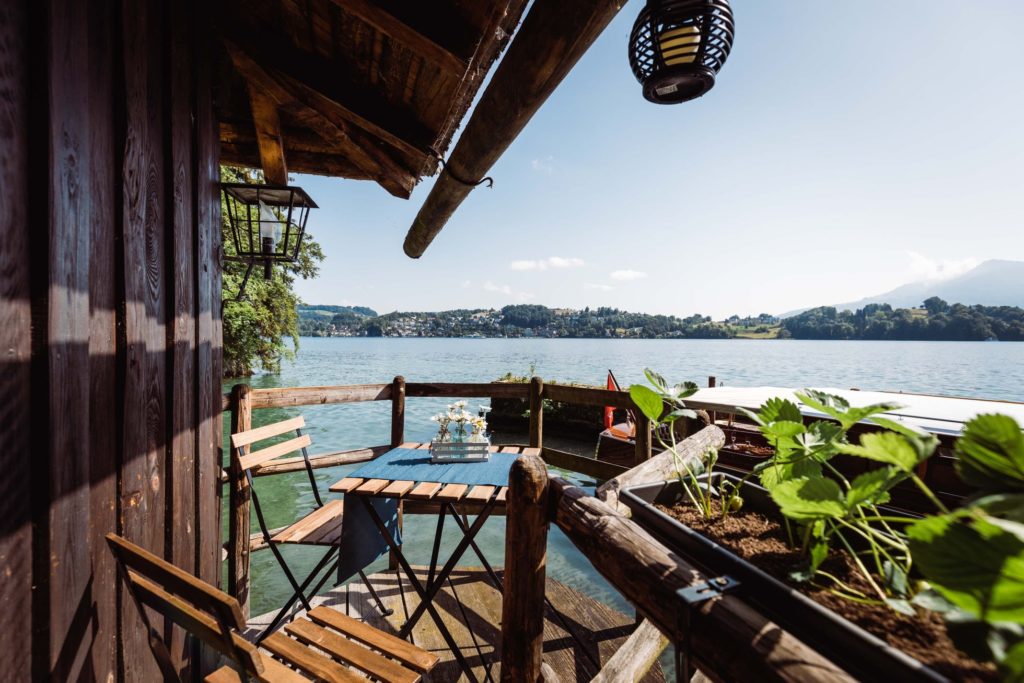 Morning Sunlight on Boathouse Terrace Overlooking the Water